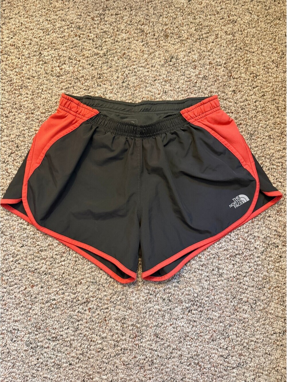 The North Face Flight series Coral red/gray athletic running shorts